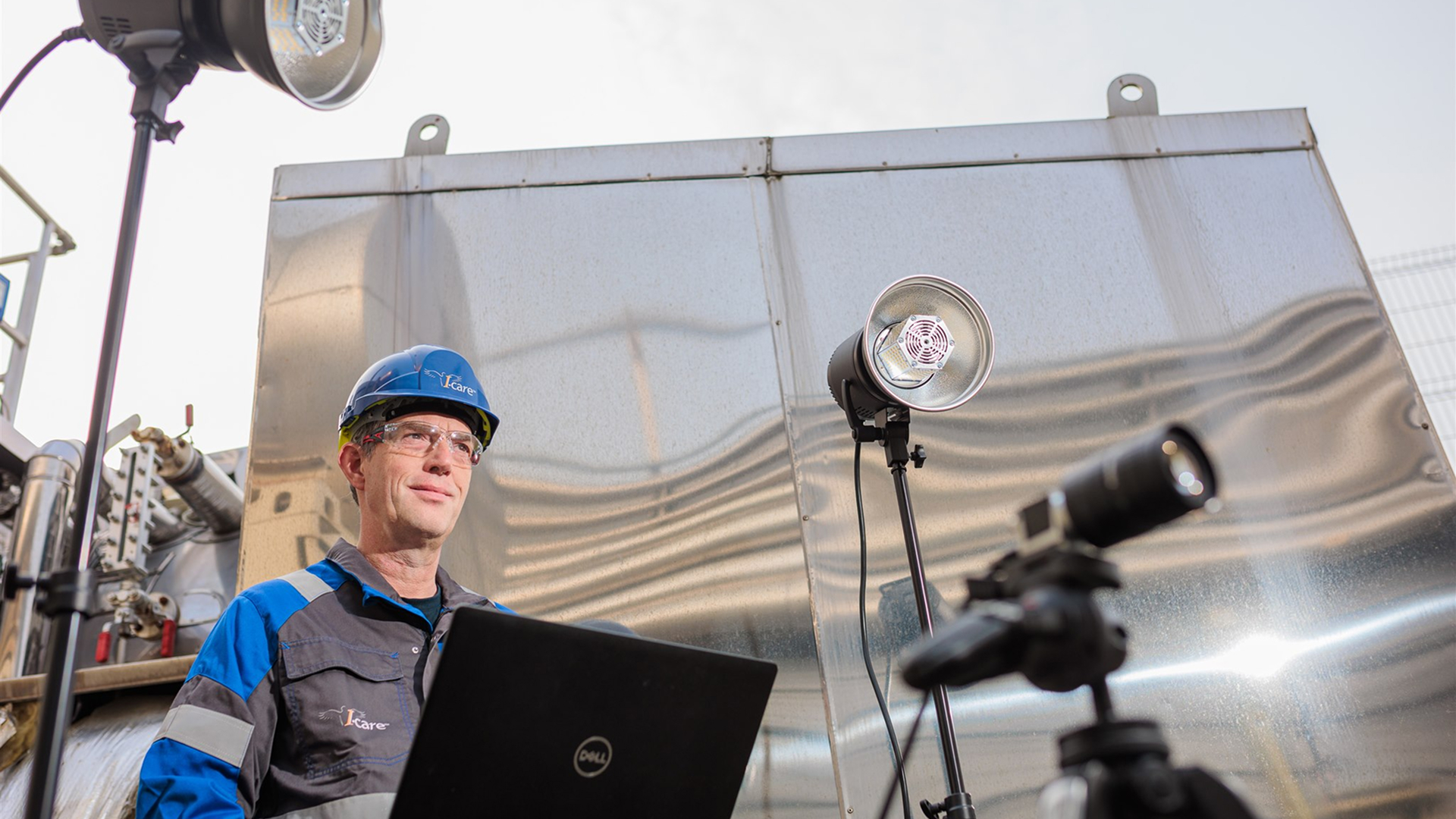 A technician capturing video data for Motion Magnification analysis on industrial equipment in a Food & Beverage plant
