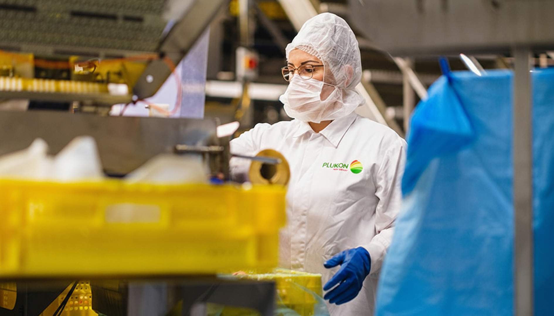 Plukon Food Group production operator working on a food processing line